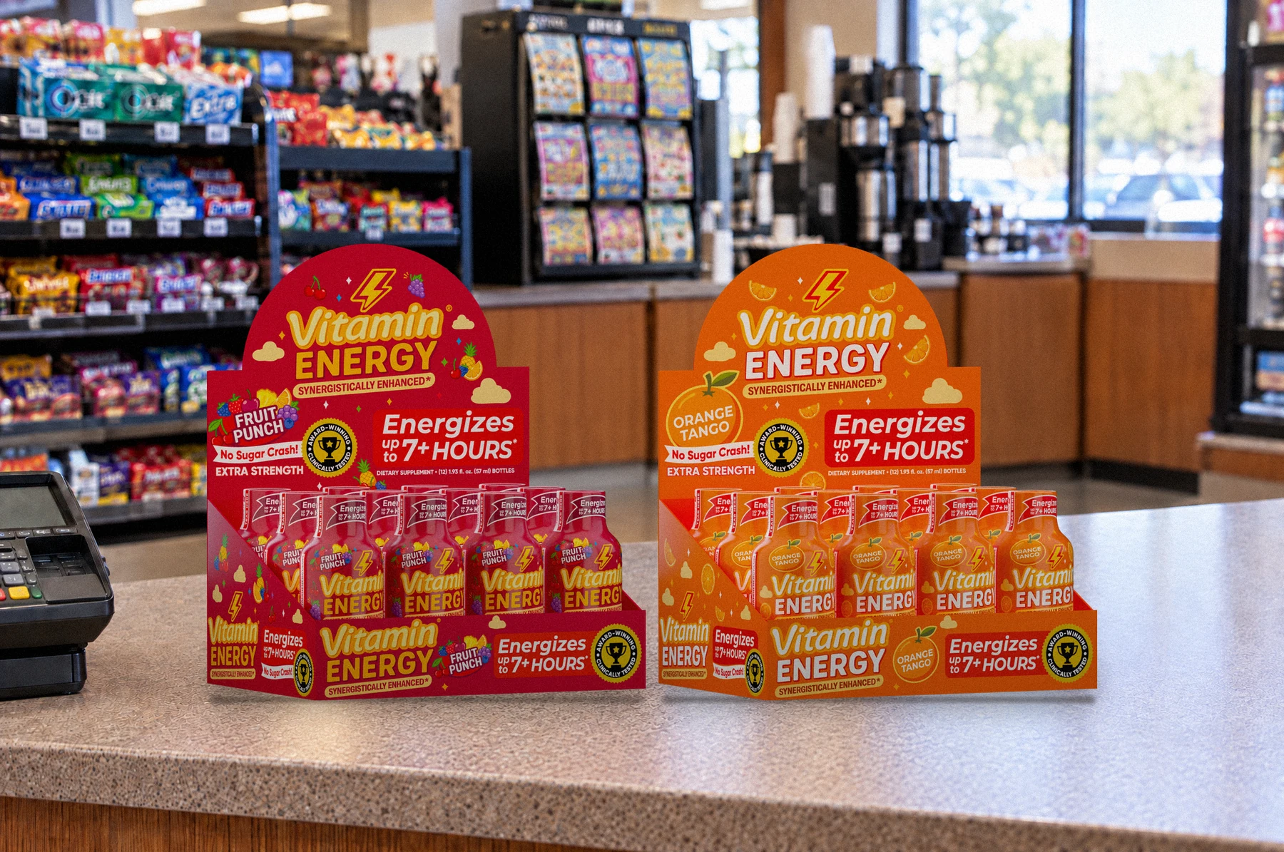 Fruit Punch and Orange Tango display cartons filled with shots on a store counter